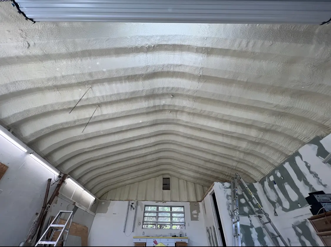 Spray polyurethane foam applied to the underside of a metal roof deck in Montecito